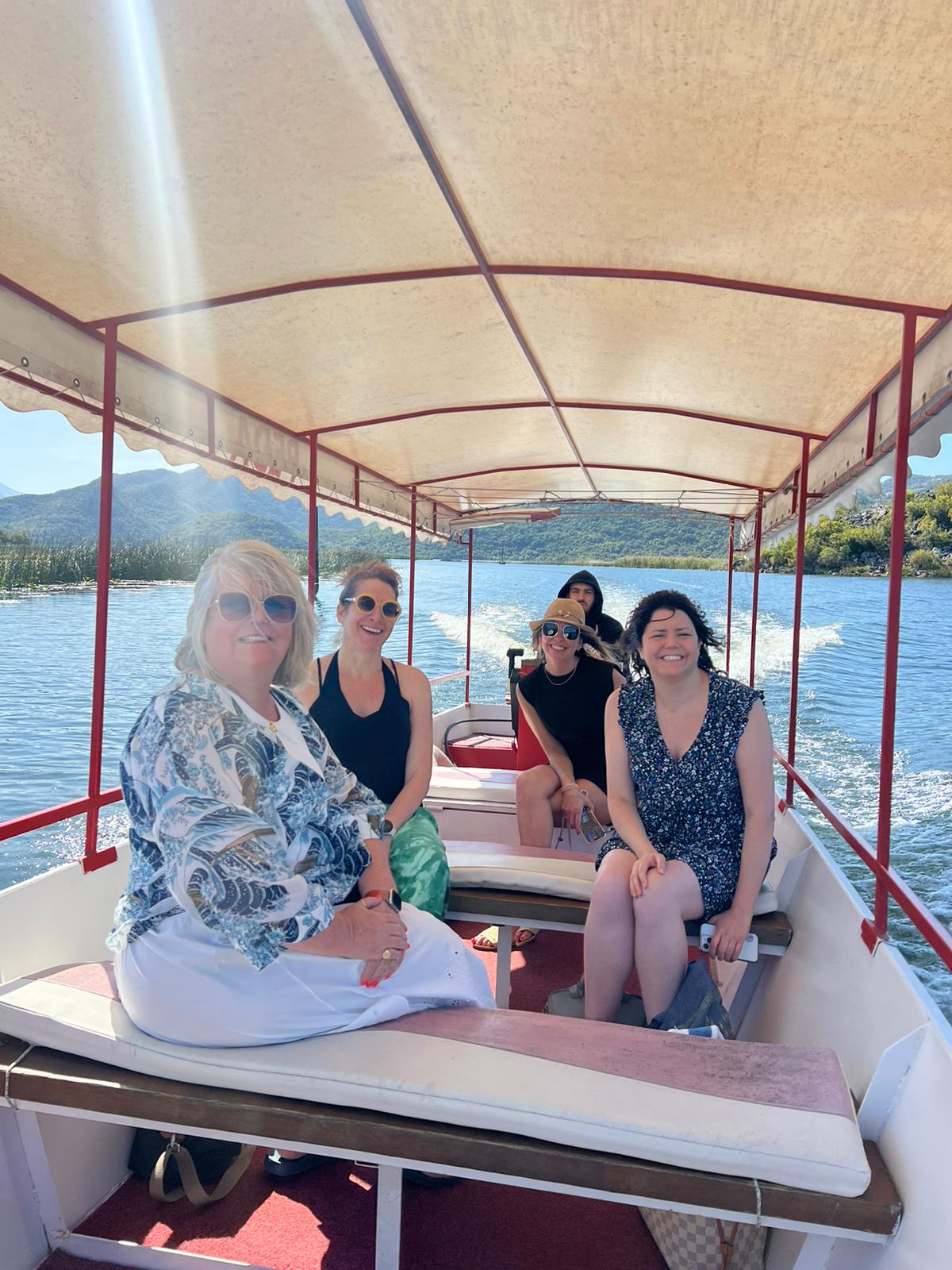Guests enjoying a boat ride on the water in Montenegro