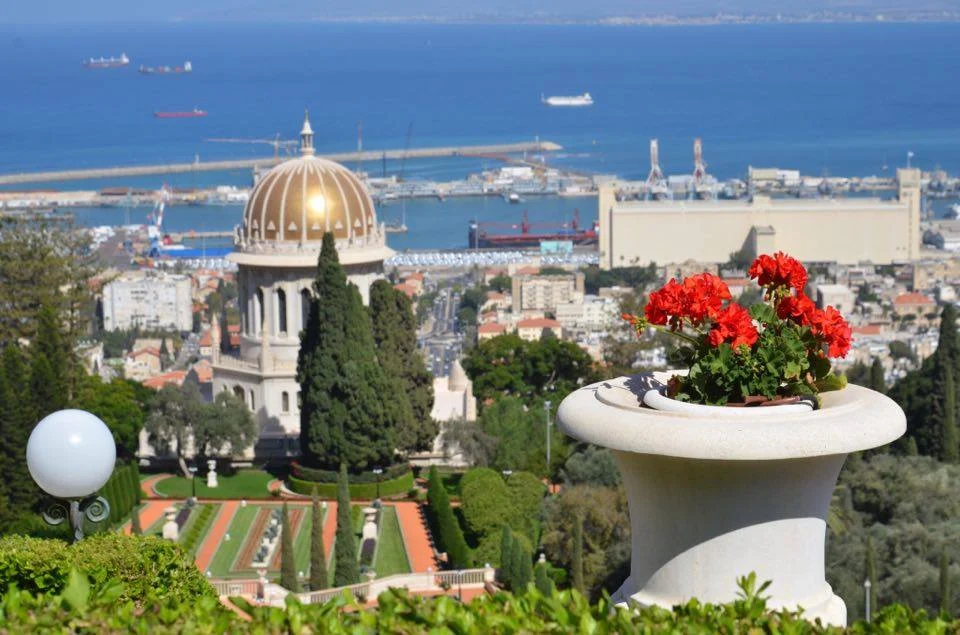 Bahá'í Gardens terraces and golden Shrine of the Báb overlooking the Haifa harbor and Mediterranean
