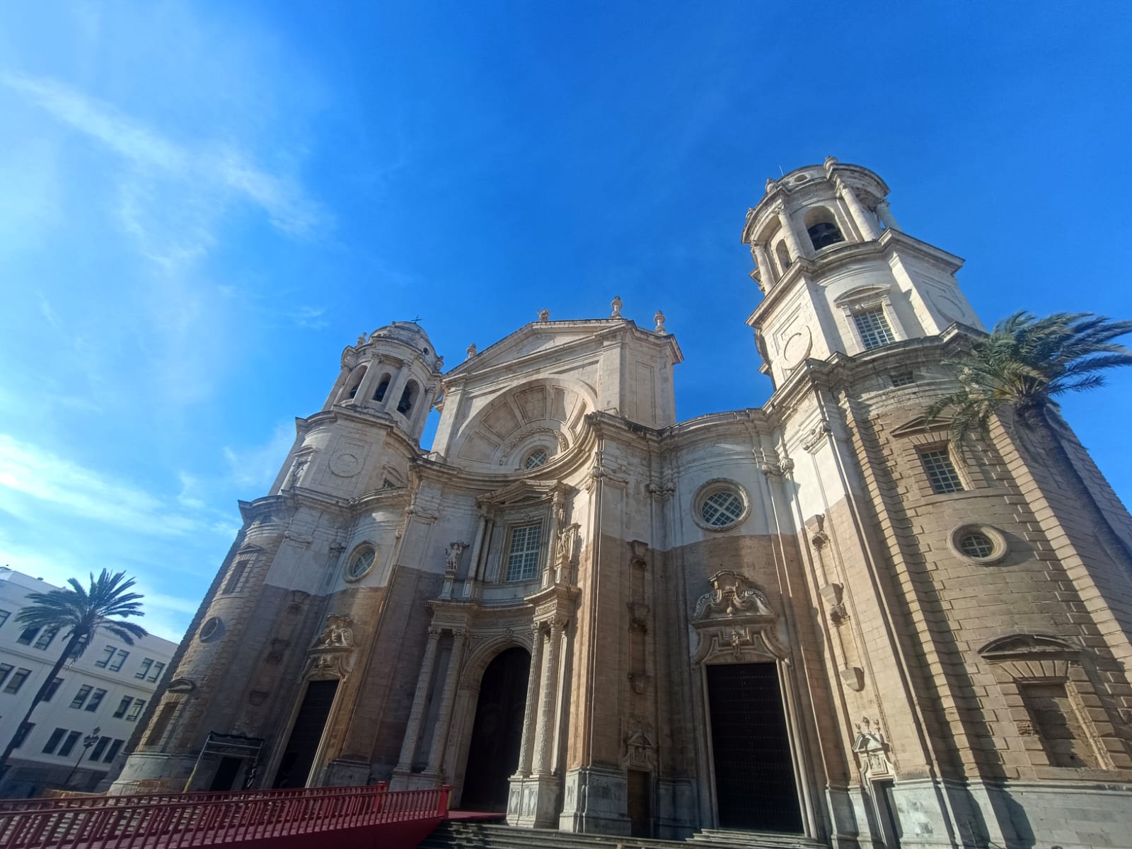 Cadiz Cathedral facade under a bright blue sky