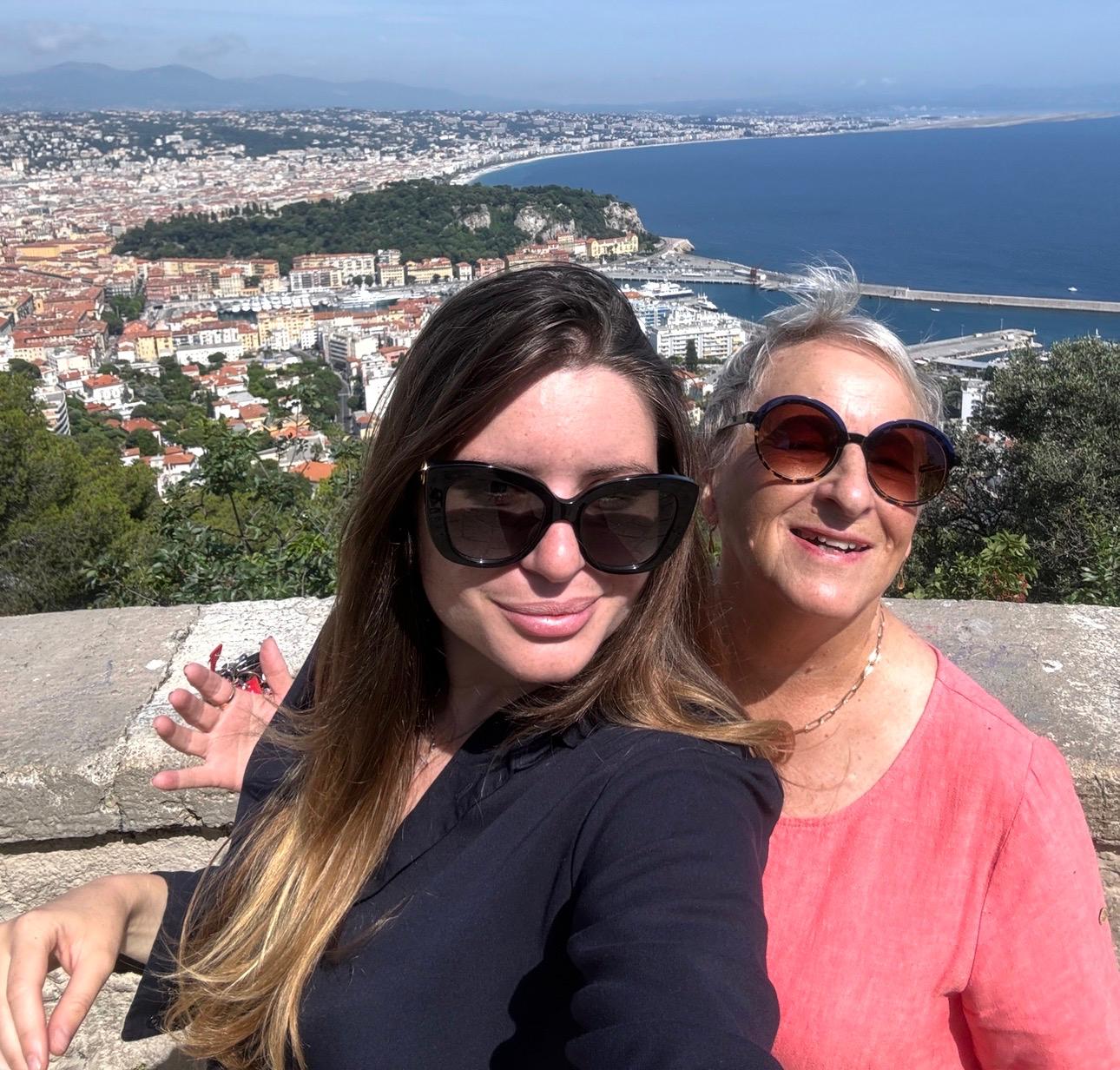 Guests at a panoramic viewpoint above the Bay of Angels in Nice
