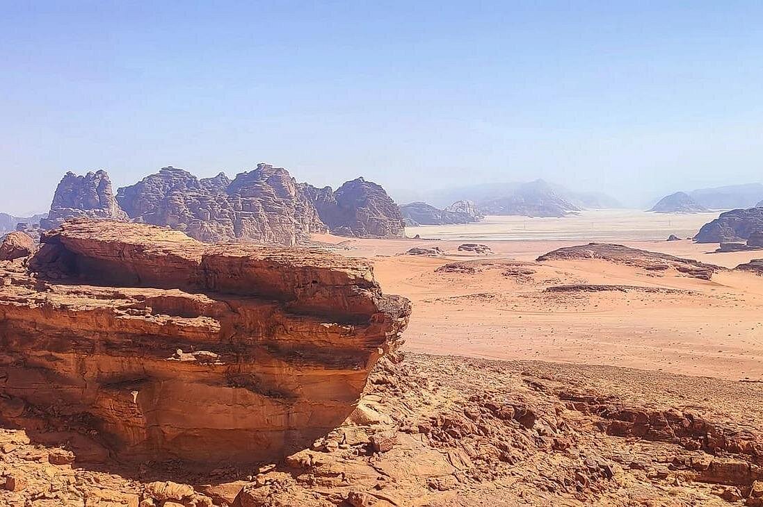 Panoramic sandstone formations across the Wadi Rum desert in Jordan