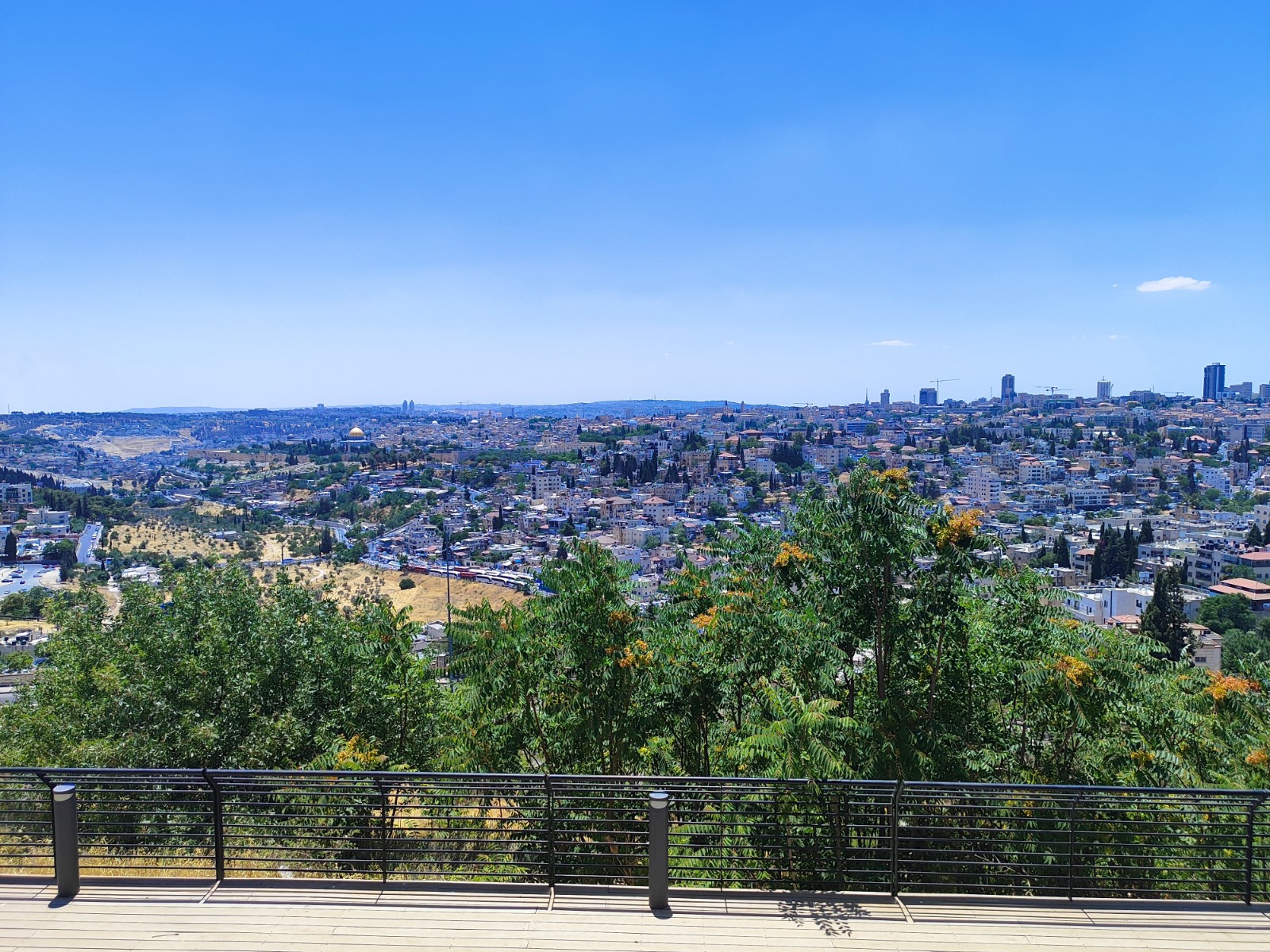 Panoramic view over Jerusalem's rooftops from a scenic lookout on the way to the Old City