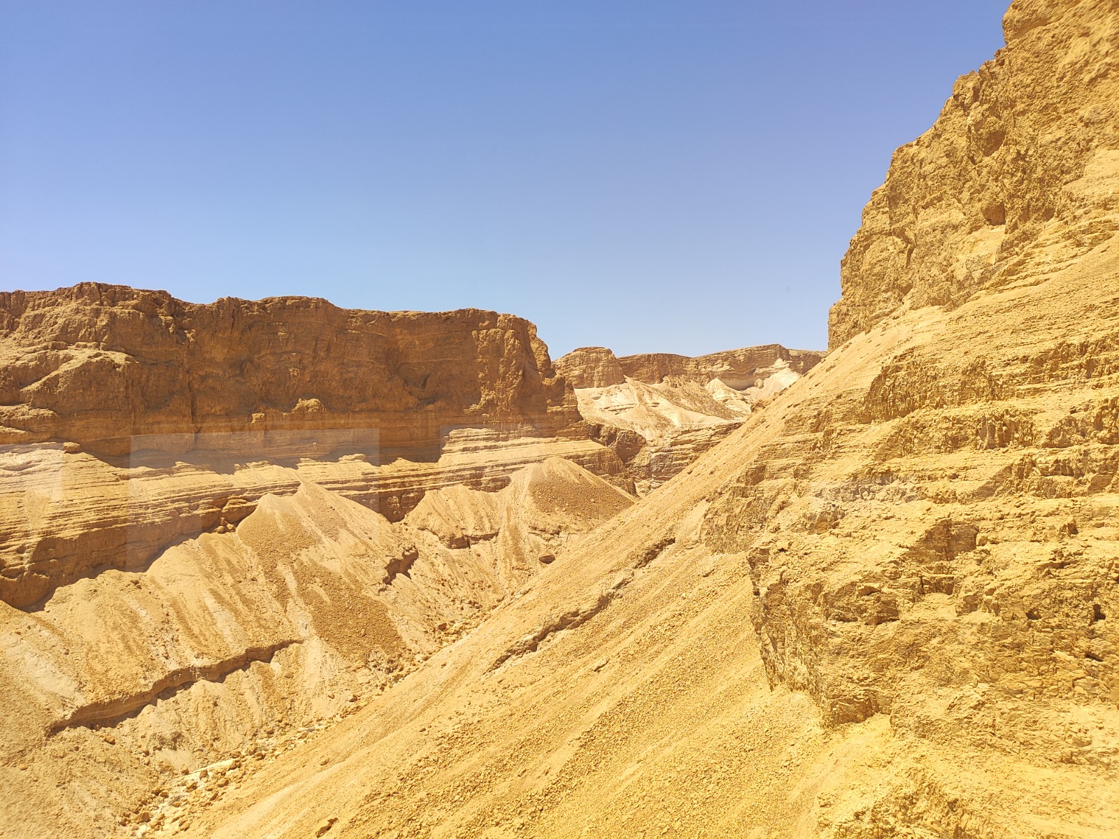 Golden cliffs of the Judean Desert surrounding Masada near the Dead Sea