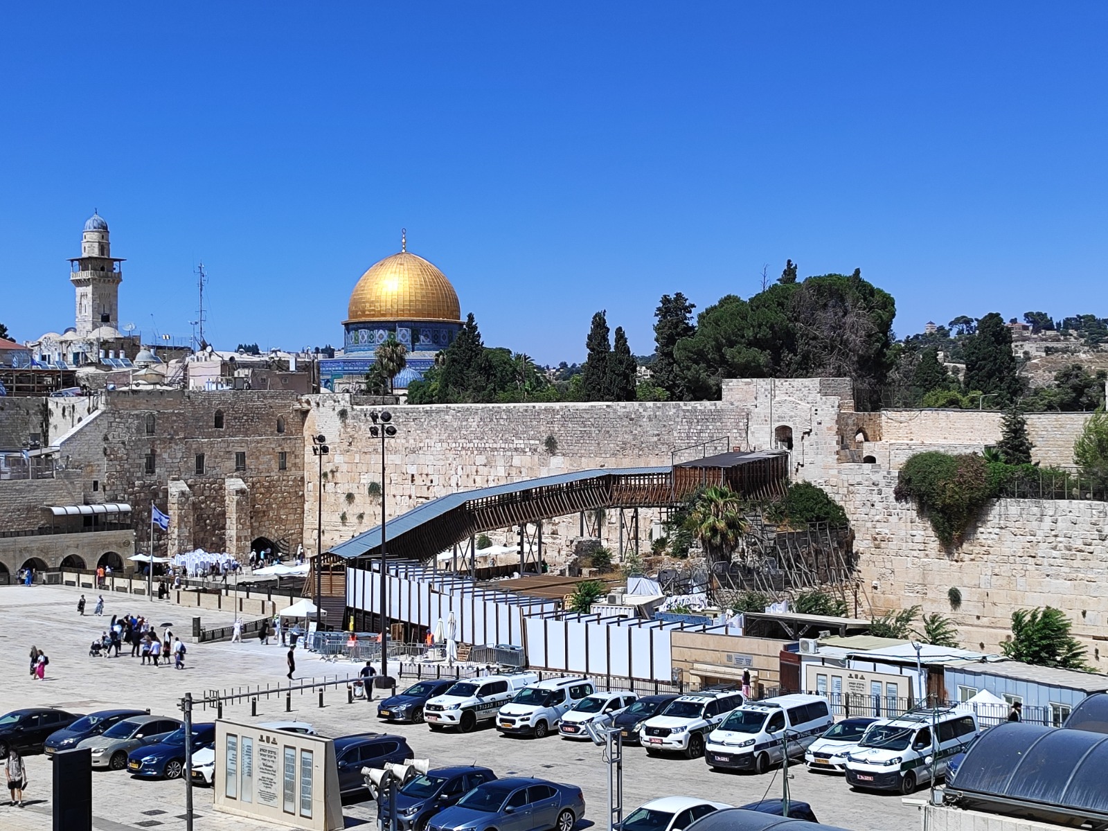 Western Wall Plaza with the golden Dome of the Rock and Mughrabi Bridge in the background