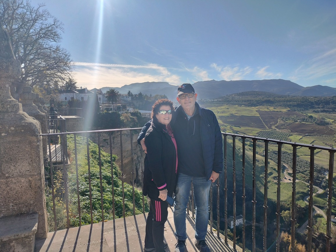 Guests enjoying a panoramic viewpoint over the Andalusian countryside