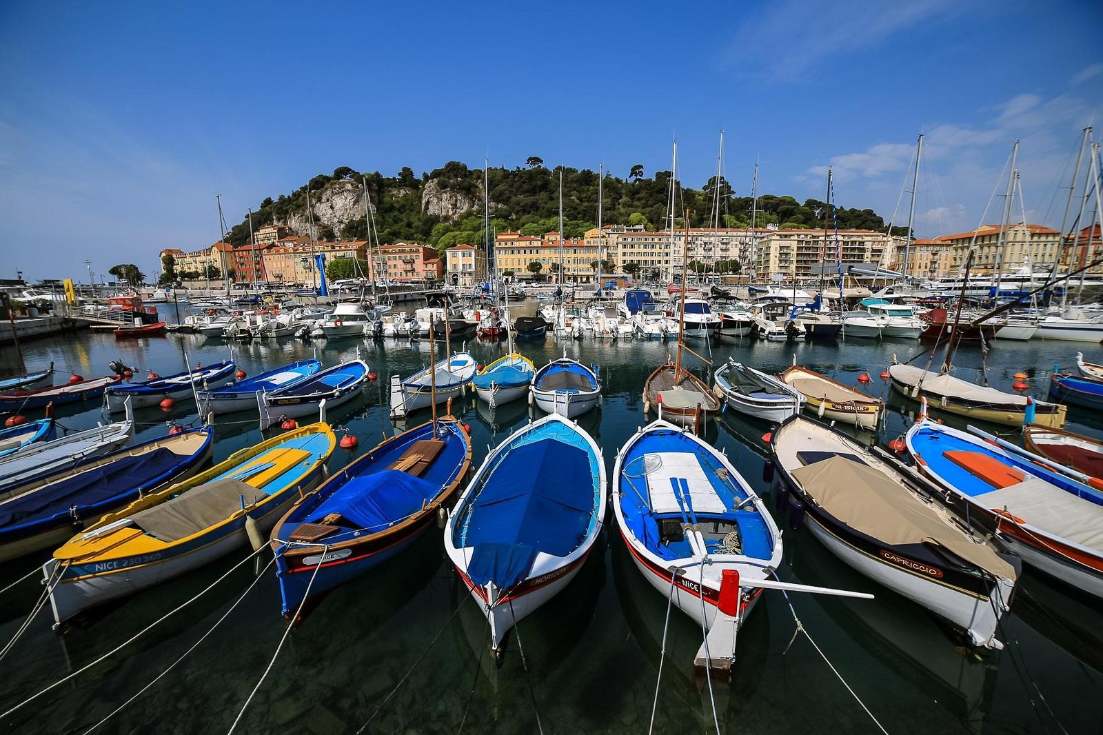 Colorful traditional fishing boats in the Old Port of Nice, French Riviera