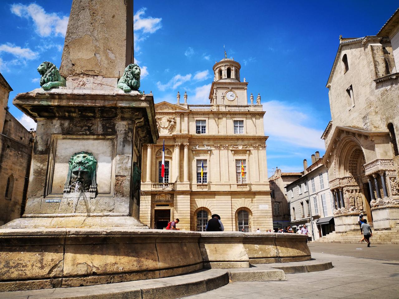 Lion fountain and town hall square in Arles