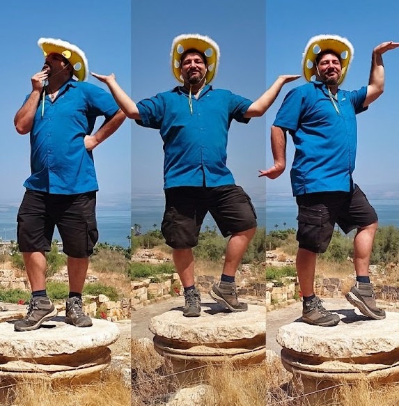 Daniel having fun with a cheese hat on a tour