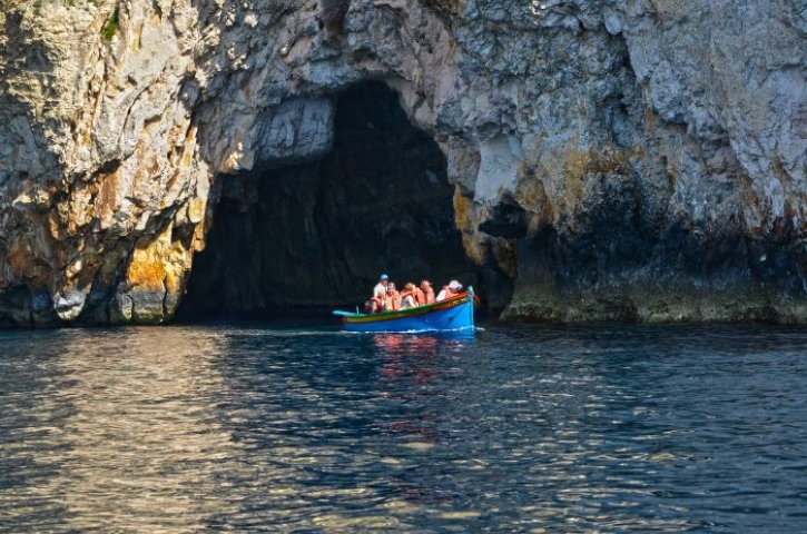 Boat trip entering the Blue Grotto caves